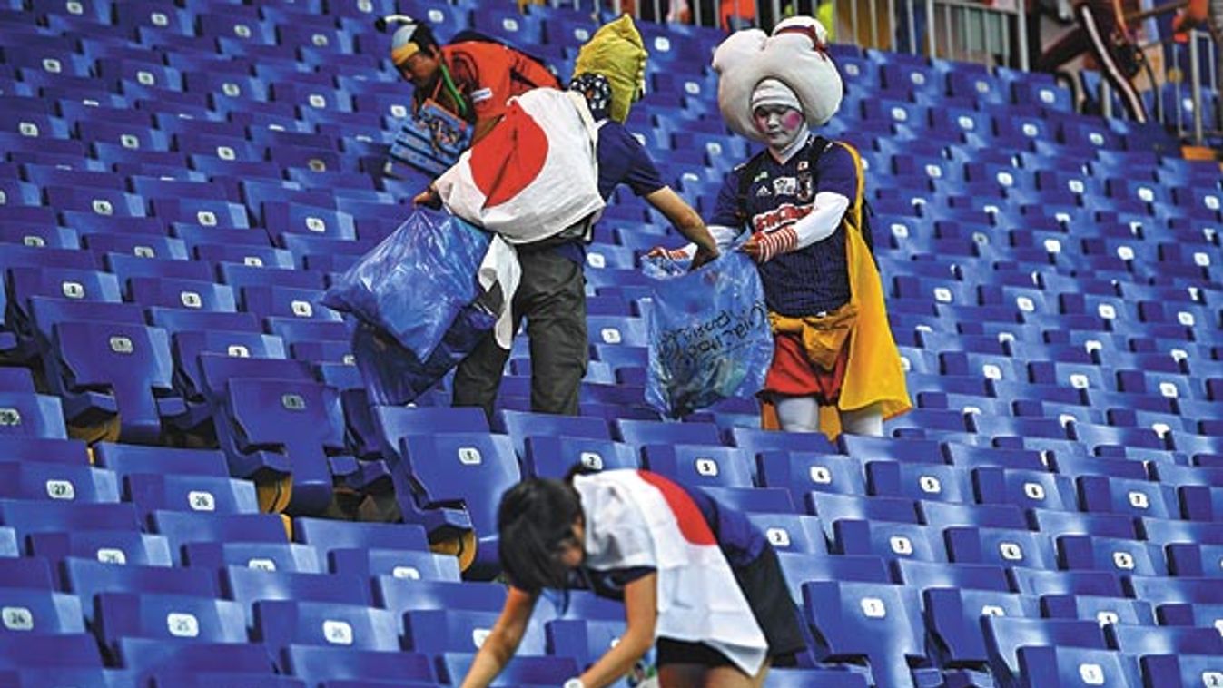 Heartbroken Japan fans clean stadium in tears after last-gasp loss to Belgium