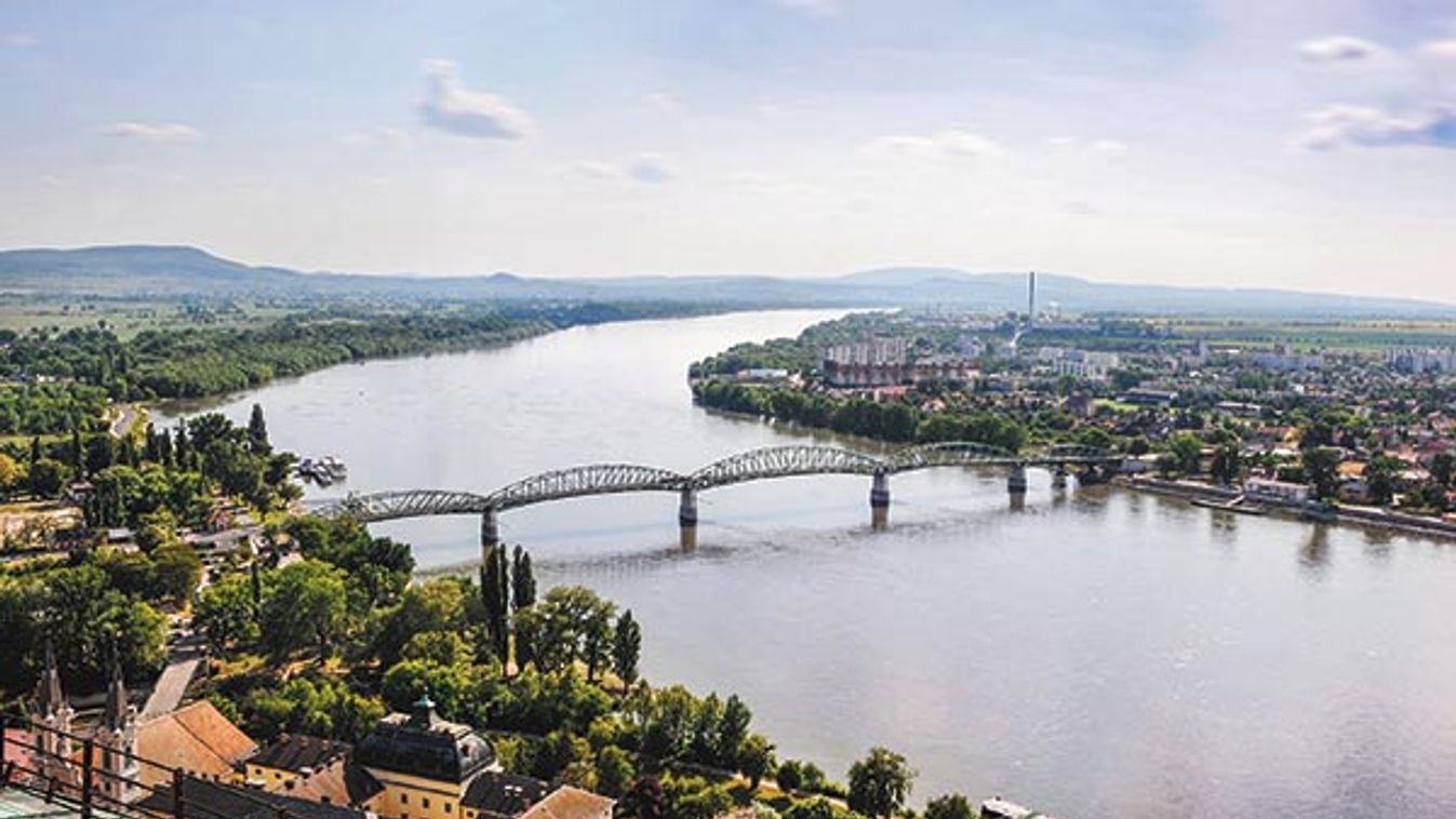 The Maria Valeria Bridge crossing the River Danube with the Slovakian border town of Sturovo right a