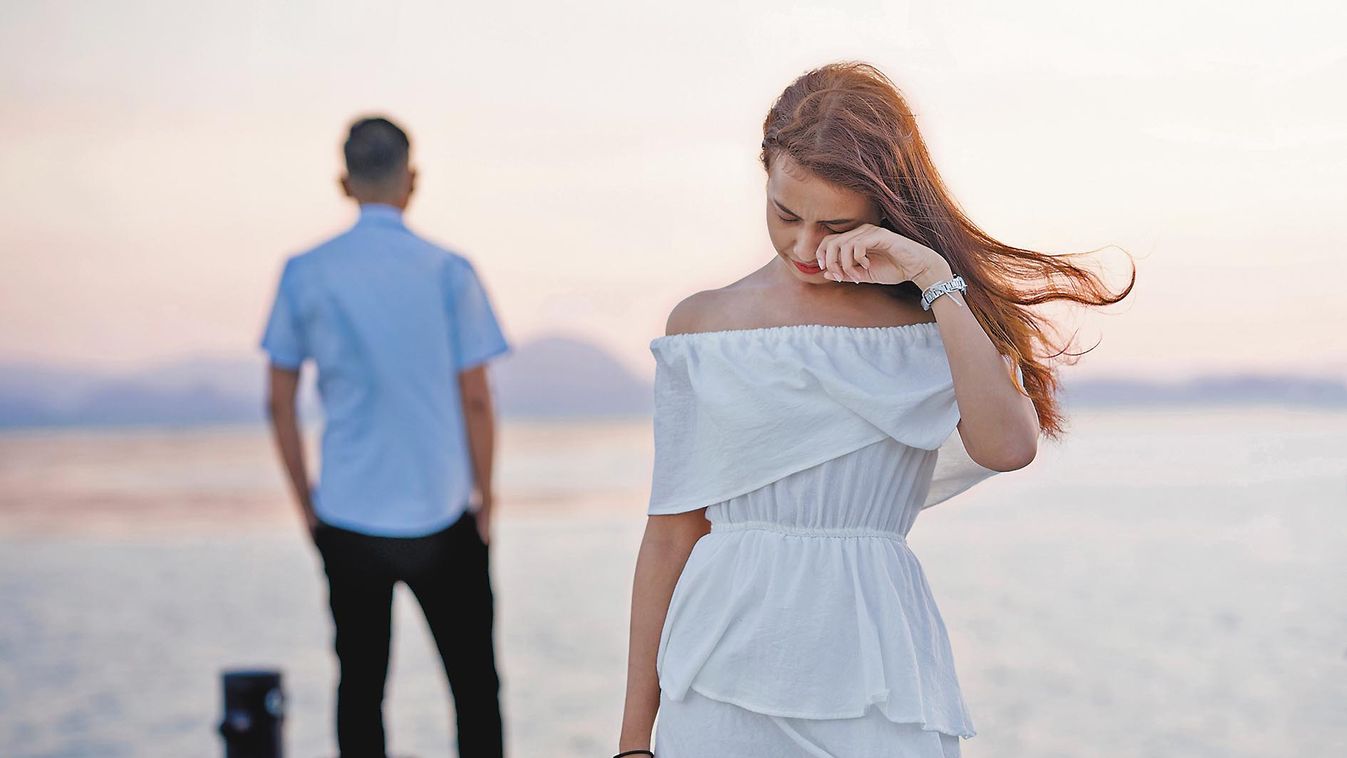 Young,Couple,Break,Up,At,The,Sea,Deck.,Girl,Crying