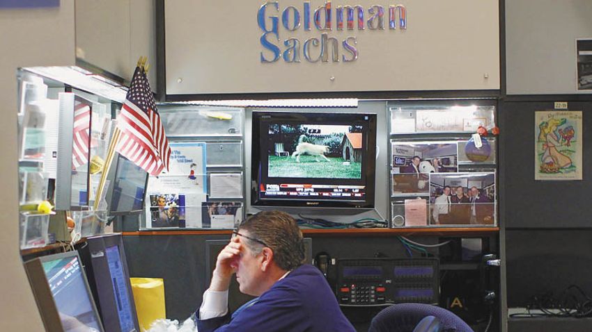 A trader works in the Goldman Sachs booth on the main trading floor of the New York Stock Exchange