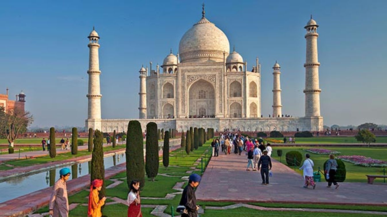 Asian tourists at The Taj Mahal mausoleum southern view Uttar Pradesh, India