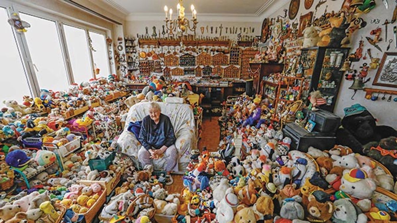 Belgian Catherine Bloemen, 86, sits among more than 20,000 stuffed and plastic toys, she is collecting for more than 65 years, in her house in Brussels