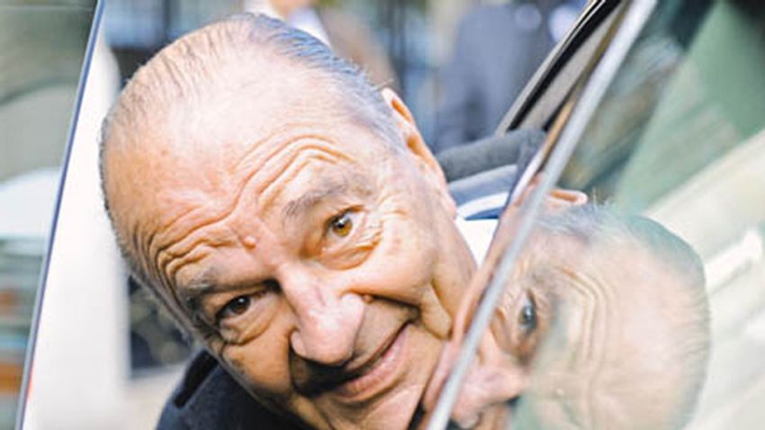 Former French President Jacques Chirac leaves after a meeting with China's President Hu Jintao in Paris