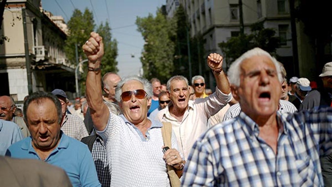 Greek pensioners shout slogans during a demonstration against planned pension cuts, in Athens