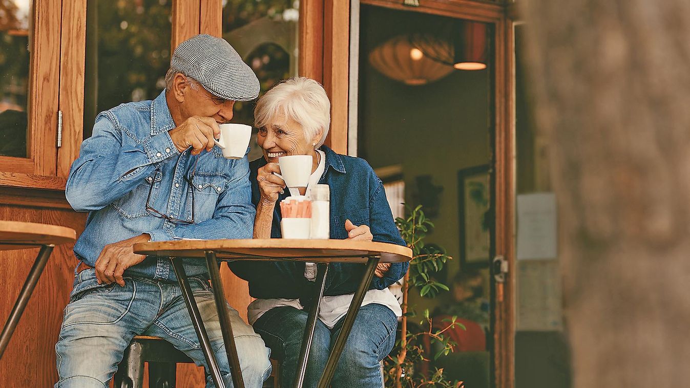 Happy,Senior,Couple,Sitting,At,Coffee,Shop,And,Talking.,Elderly