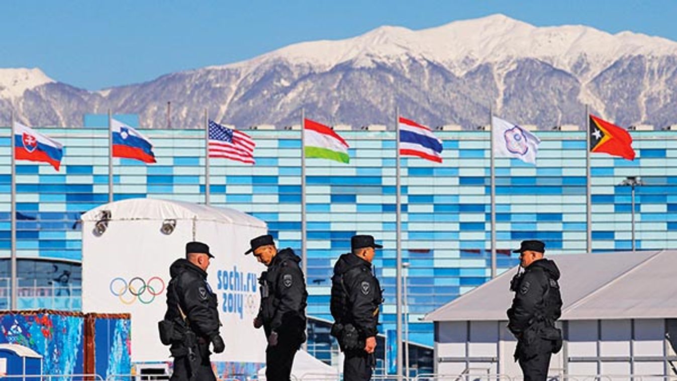 Security personnel patrol the Olympic Park at the 2014 Sochi  Winter Olympic Games
