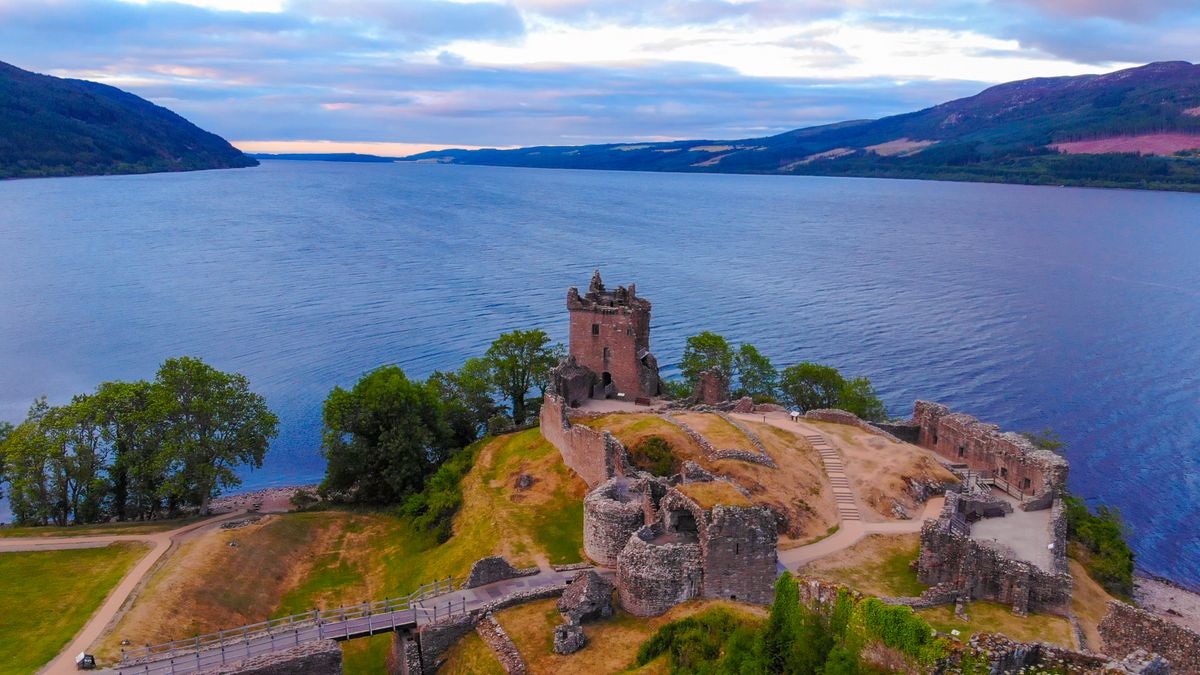Loch,Ness,And,Urquhart,Castle,In,The,Evening,-,Aerial