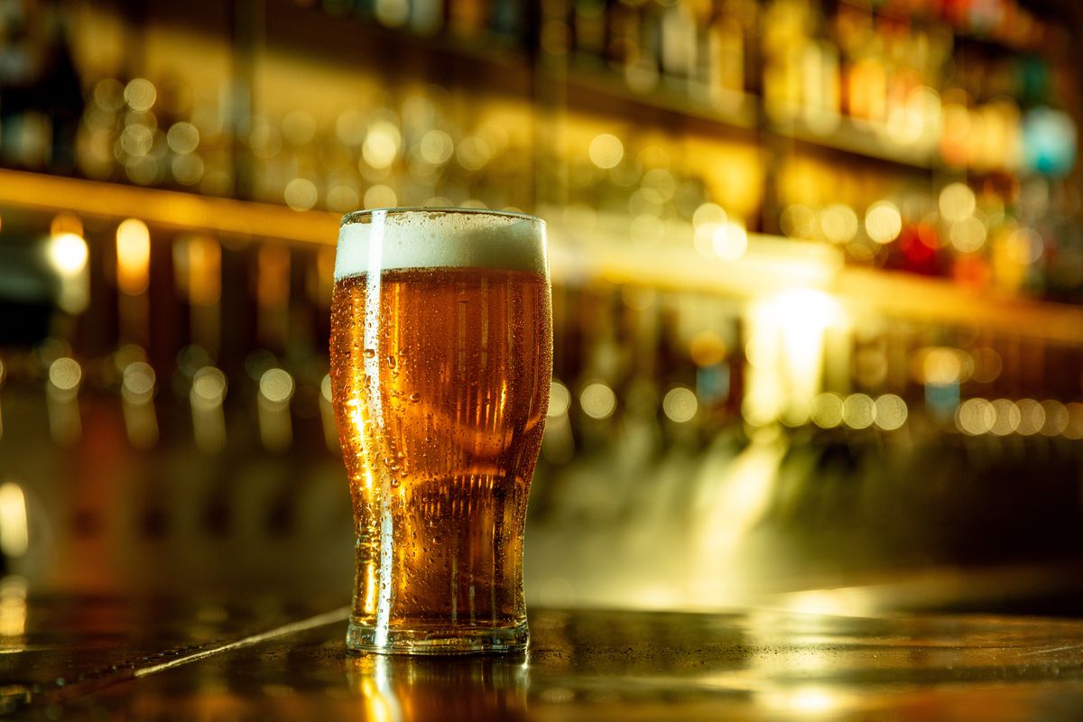 Refreshing,Pint,Of,Beer,With,Bright,Foam,And,Cold,Drops