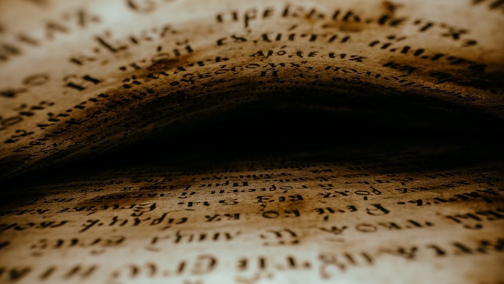 Macro,Background,Of,Saved,Medieval,Book,With,Ancient,Writings,,Mystical