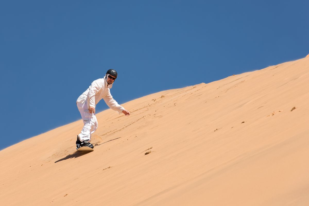 Sandboarder,Going,Down,The,Slope