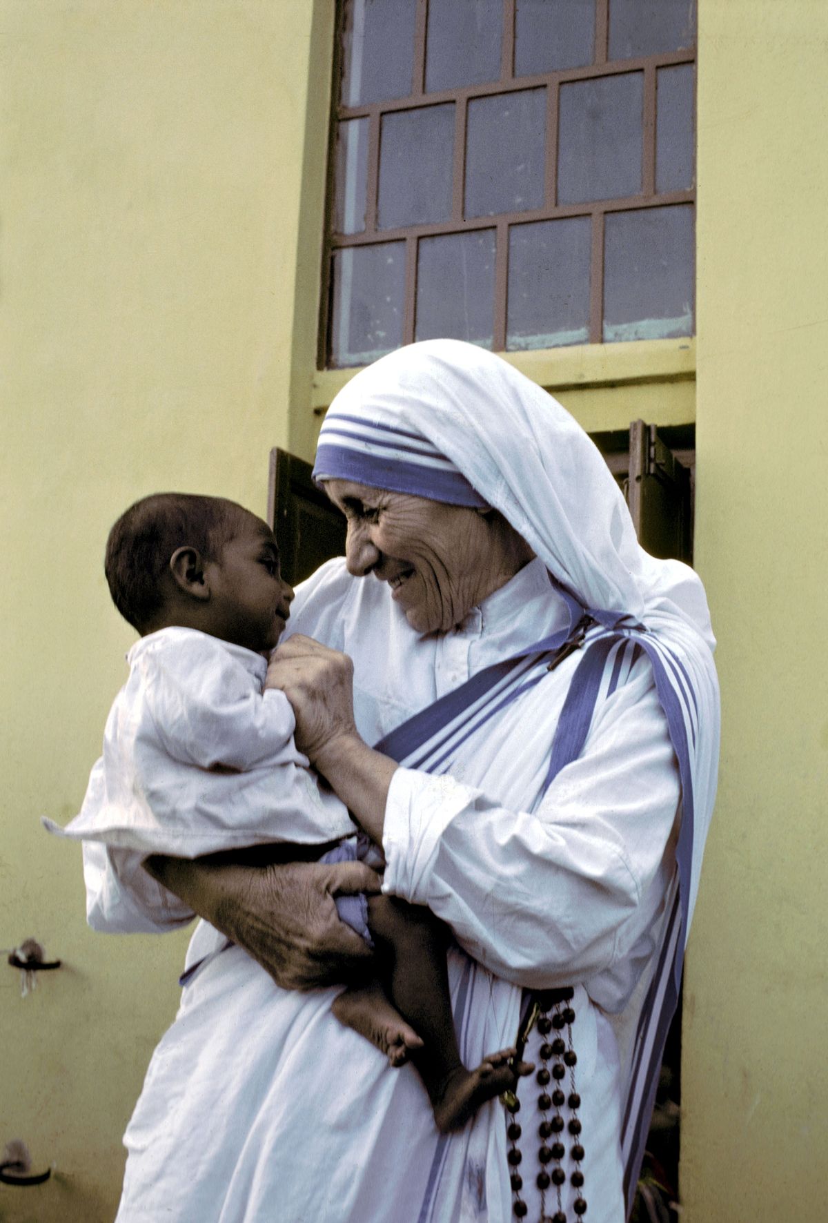 Mother Teresa and the poor in Calcutta, India in October, 1979.