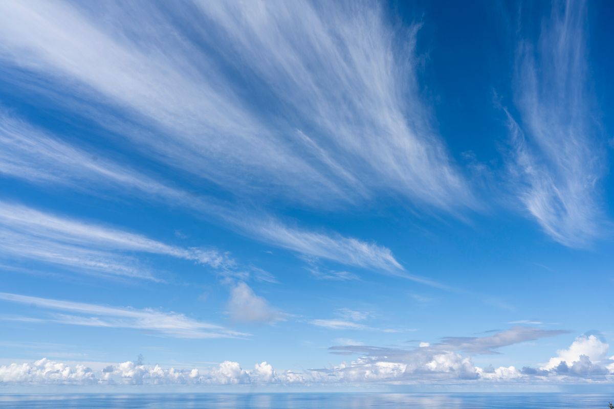 Blue sky with wispy clouds